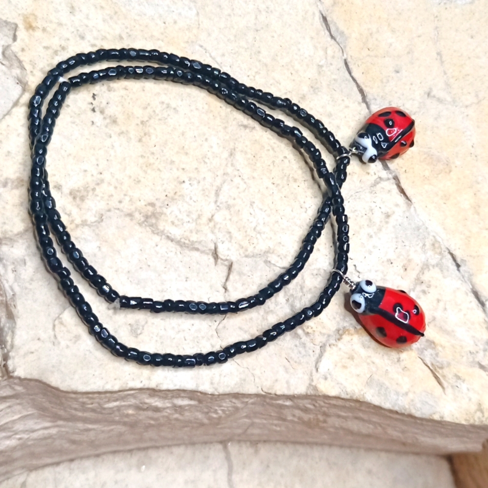 Lamp work glass Ladybug bracelet stretchy black glass seed beads